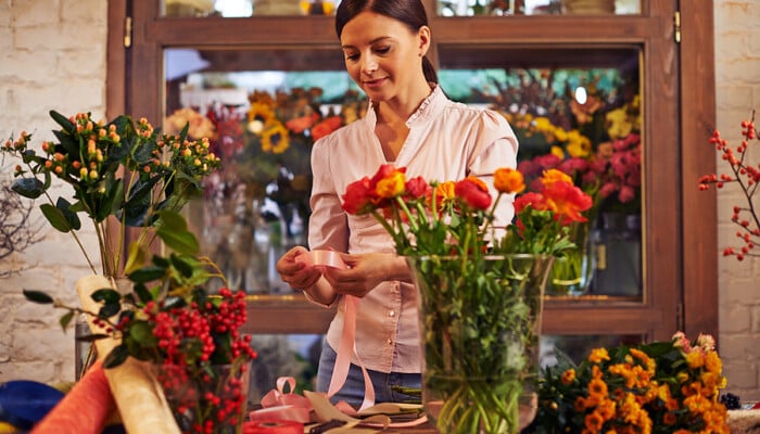 bigstock Flower girl working with flowe 79107589